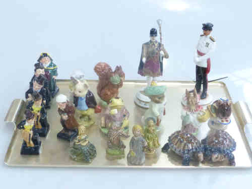 A Collection of Doulton, Beswick, Wade and Michael Sutty Figures