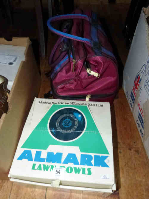 Box of Almark Lawn Bowls and a Bag of Lawn Bowls