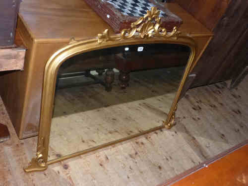Victorian Gilt Framed Overmantel Mirror with scroll and shell decoration, 126cm long