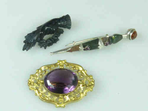 Scottish Silver and Agate Brooch, in the Form of a Dirk; a Victorian Jet Brooch and a Large