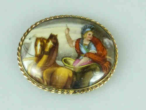 Continental 9ct Gold Mounted Brooch, the Porcelain Panel Decorated with a Figure in a Chariot,