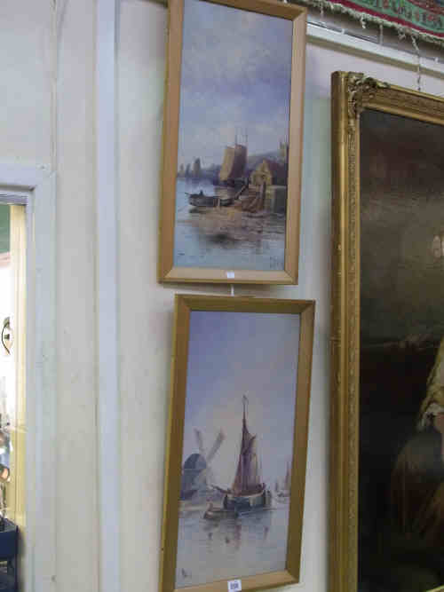 J Bale - `Dutch Fishing Boats in Harbour`, Pair of oil paintings on board, 58cm x 28cm, in gilt slip