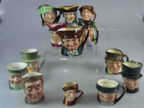 A Collection of Thirteen Royal Doulton and Beswick Small Character Jugs