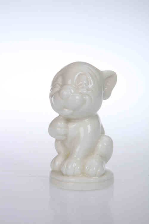 A Royal Worcester Bonzo dog figure, c. 1930, white-glazed, no. 2855, brown printed mark. 8cm