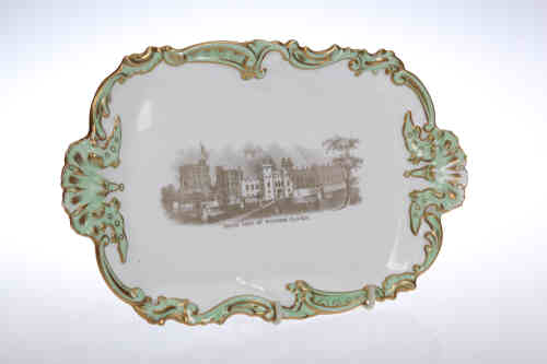 An English porcelain tray, c. 1830-35, of rounded oblong form, with light green painted scroll edges