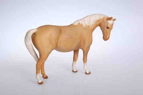 A Beswick model of a mare, modelled head down facing right, no. 1812, palomino matt. 14.5cm