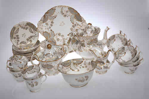 A Rockingham porcelain tea and coffee service, c.1830-40, comprising teapot, sucrier, slop bowl,