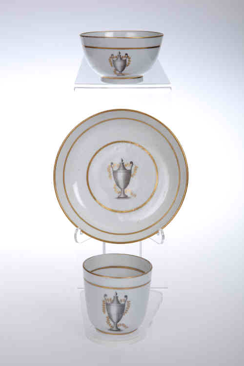 A Factory "Z" porcelain trio, c. 1800, comprising coffee cup, tea bowl and saucer, gilded and bat