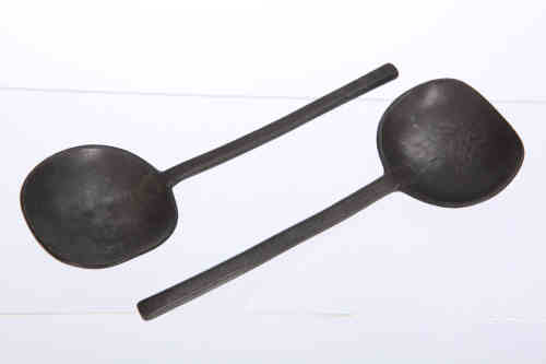 A pair of pewter slip top spoons, 17th century, the round bowls with crowned rose mark. 17cm