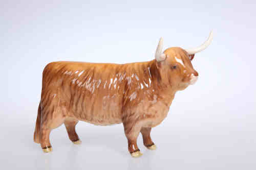 A Beswick model of a Highland cow, no. 1740, gloss. 13cm