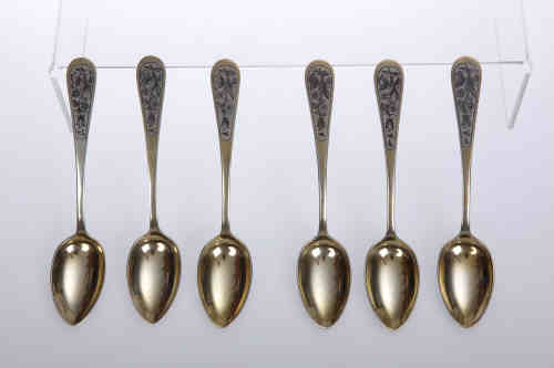 A set of six Russian silver and niello work spoons, each decorated front and back with foliage. 7.