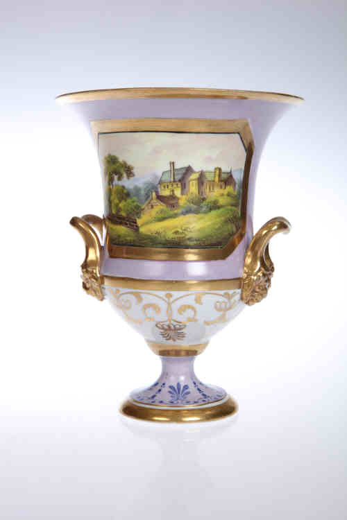 A good English porcelain campana shaped vase, probably Coalport, c. 1810, with gilt double lion mask