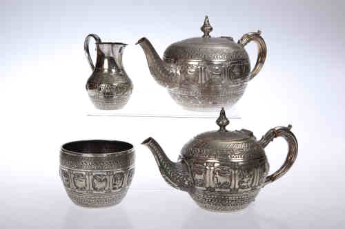 An Elkington & Co silver-plated four piece tea service, each piece engraved with bands of foliage