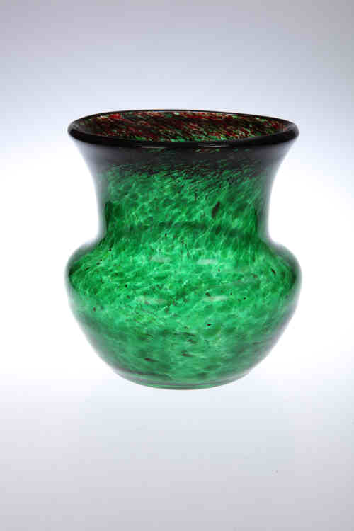 A Monart glass vase, the mottled green body with red inclusions to the neck, polished pontil. 22cm