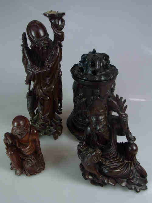 Three Eastern Carved Wood Figures and a Carved Wood Box with Figure Decoration (4)