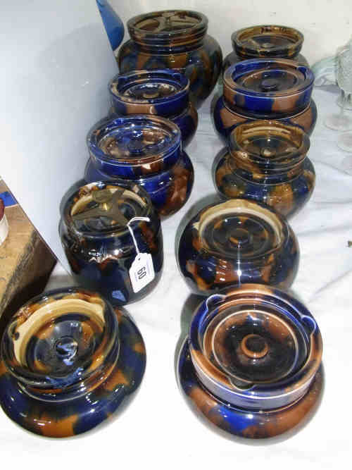 Collection of Ten Pottery Tobacco Jars