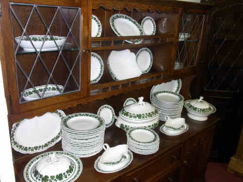 Continental Porcelain Dinner Service, having green leaf decoration (65 pieces)