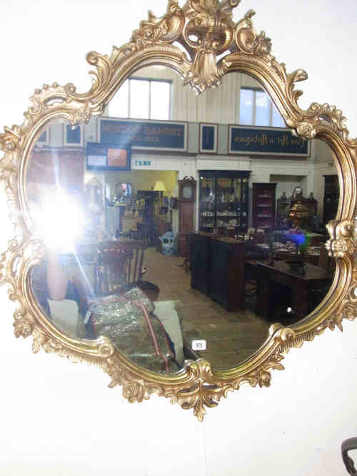 Ornate Gilt Framed Shaped Wall Mirror