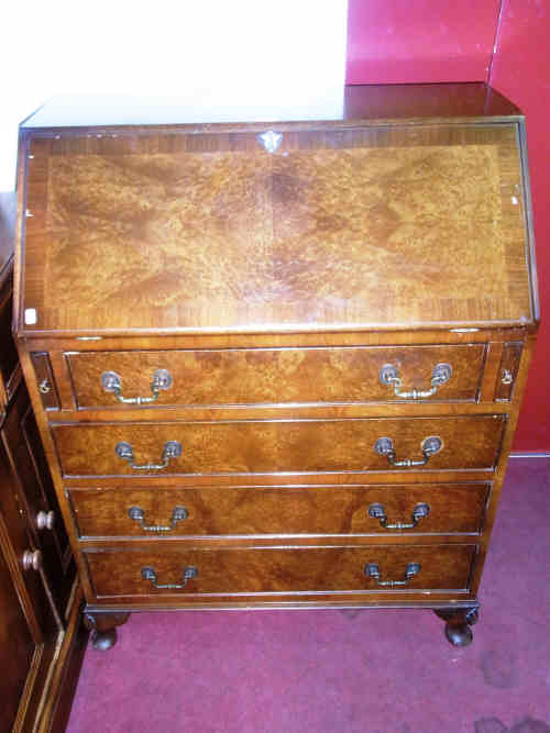 Burr Walnut Four Drawer Bureau on cabriole legs