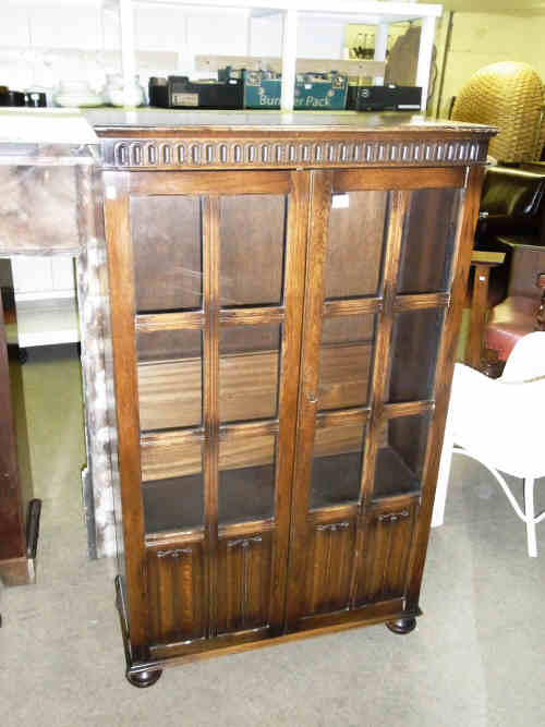 Oak Linen Fold and Glazed Panel Two Door Bookcase