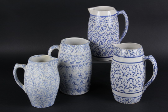 (4 PCS) SPONGEWARE - 19th c Stoneware Milk Pitchers in typical ovoid form with flat-top scrolled