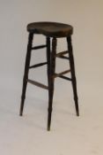 A Victorian pine bar stool, height 85 cm. CONDITION REPORT: Fair condition, slightly loose.