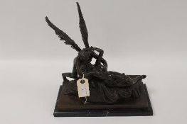 After Antonio Canova - A bronze study of Cupid and Psyche, on black marble plinth, height 36 cm.