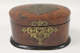 A late nineteenth century burr walnut tea caddy, stamped 'Pearce, London', width  22 cm. CONDITION