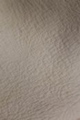 An early twentieth century hand stitched Durham quilt - white. CONDITION REPORT: Good. Slight