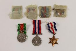 A group of seven WW II medals awarded to E.W. and F. Lee, with suspension ribbons. (7) CONDITION