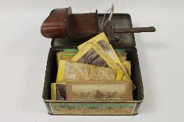 A nineteenth century mahogany stereoscope viewer, together with stereocards. (Q). CONDITION