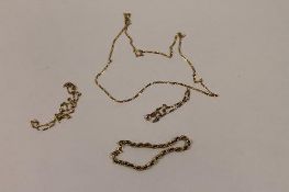 Two 9ct gold necklaces, together with two 9ct gold bracelets, 12.8g. (4) CONDITION REPORT: Good