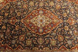 An Iranian fringed carpet, 144 cm x 236 cm. CONDITION REPORT: Good condition.