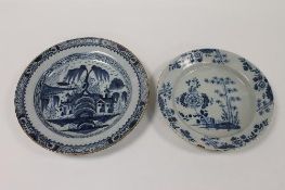 Two eighteenth century blue and white tin-glazed Delft chargers. (2) CONDITION REPORT: Conditon