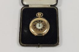 A 9ct gold half-hunter pocket watch. CONDITION REPORT: Good condition, requires a replacement