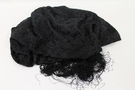 A late Victorian black silk Lady's shawl. CONDITION REPORT: Good condition.