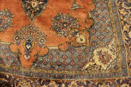 A fringed Persian carpet, 333 cm x 236 cm. CONDITION REPORT: Good condition.