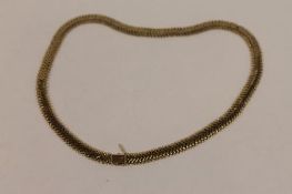 A 9ct gold flat-link necklace, 25.6g. CONDITION REPORT: Good condition.