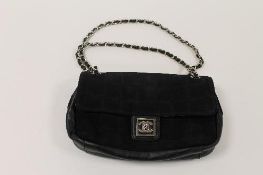 A Chanel black suede and leather shoulder bag, tag reference 12350740. CONDITION REPORT: Excellent