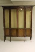A Victorian mahogany display cabinet on reeded legs, width 153 cm. CONDITION REPORT: Good