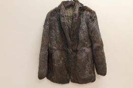 A Lady's reversible rabbit fur coat CONDITION REPORT: good condition, no clear signs of damage