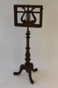 A Victorian mahogany duet stand, height 120 cm. CONDITION REPORT: Fair condition, some missing