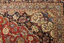 An Iranian fringed carpet, 399 cm x 297 cm. CONDITION REPORT: Good condition.