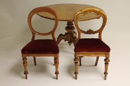 A Victorian mahogany breakfast table width 118 cm, together with six Victorian chairs. (7) CONDITION