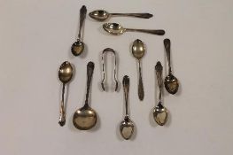 Nine silver teaspoons and a pair of sugar tongs, various. (10) CONDITION REPORT: Part sets,