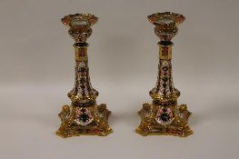 A pair of Royal Crown Derby Imari patterned candlesticks, height 27 cm. (2) CONDITION REPORT: