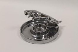 A Jaguar car mascot ashtray, width 17.5 cm. CONDITION REPORT: Good condition, indistinctly marked to