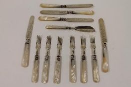 Twelve silver and mother of pearl knives and forks. (12) CONDITION REPORT: Six forks, five knives