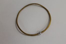 A 9ct gold choker necklace. CONDITION REPORT: Good condition, staped 9KT. Weave design no breaks