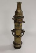 An early twentieth century John Morris & Son brass fire hose nozzle, length 41.5 cm. CONDITION
